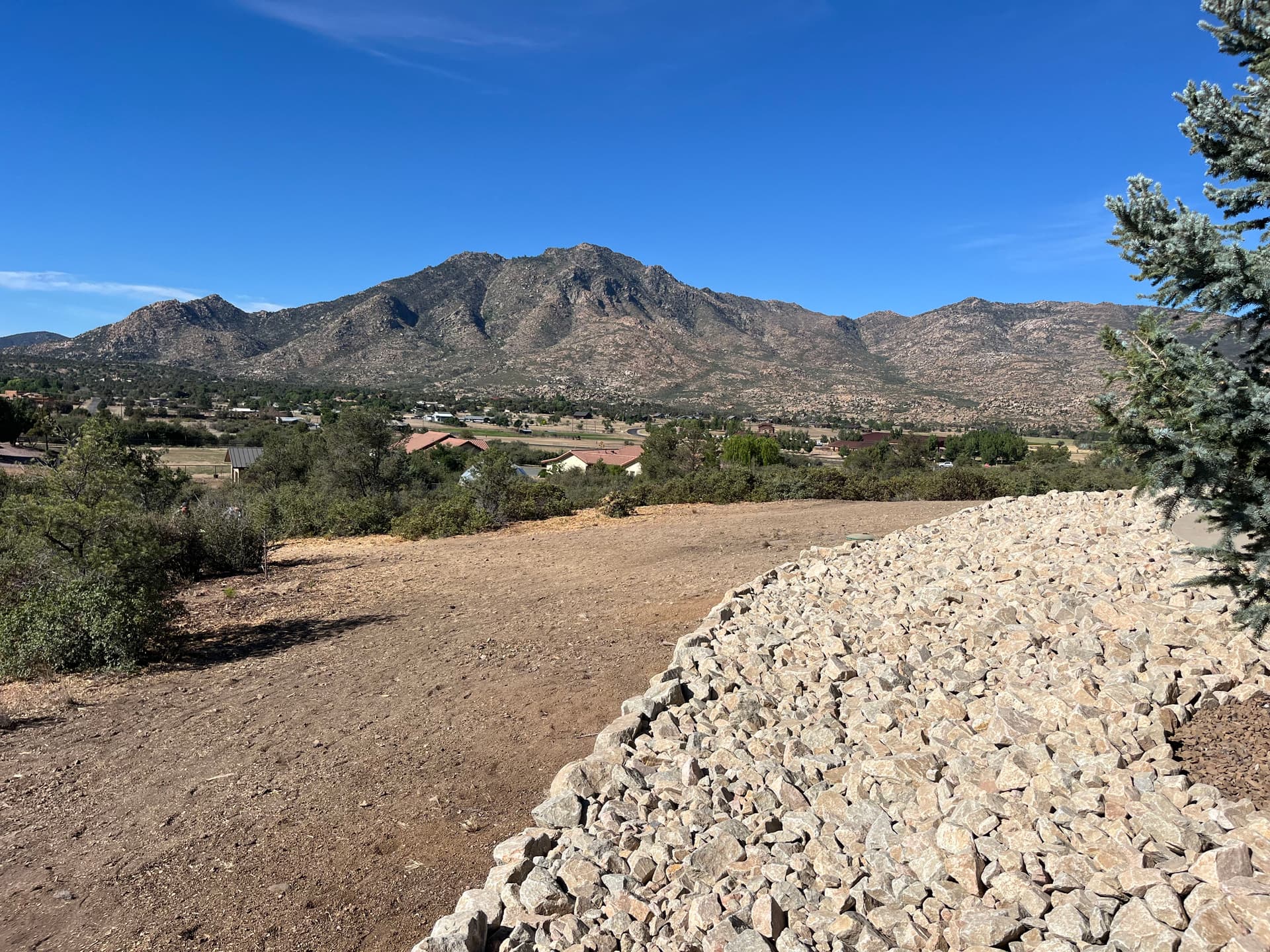 Gallery photos for Granite Riprap Retaining Wall Built for a Hillside Home in Williamson Valley: Image #3