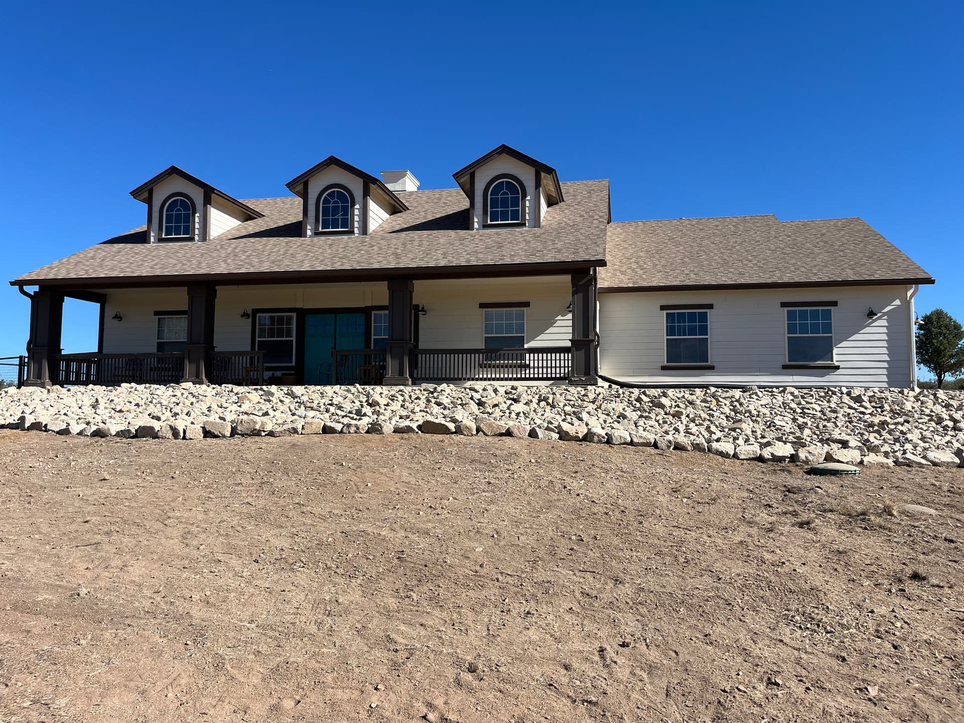 Gallery photos for Granite Riprap Retaining Wall Built for a Hillside Home in Williamson Valley: Image #2